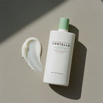 [Skin1004] Madagascar Centella Tea-Trica Soothing Sun Milk 50ml — Protection solaire apaisante légère - texture